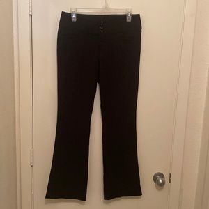 Black flared leg slacks.